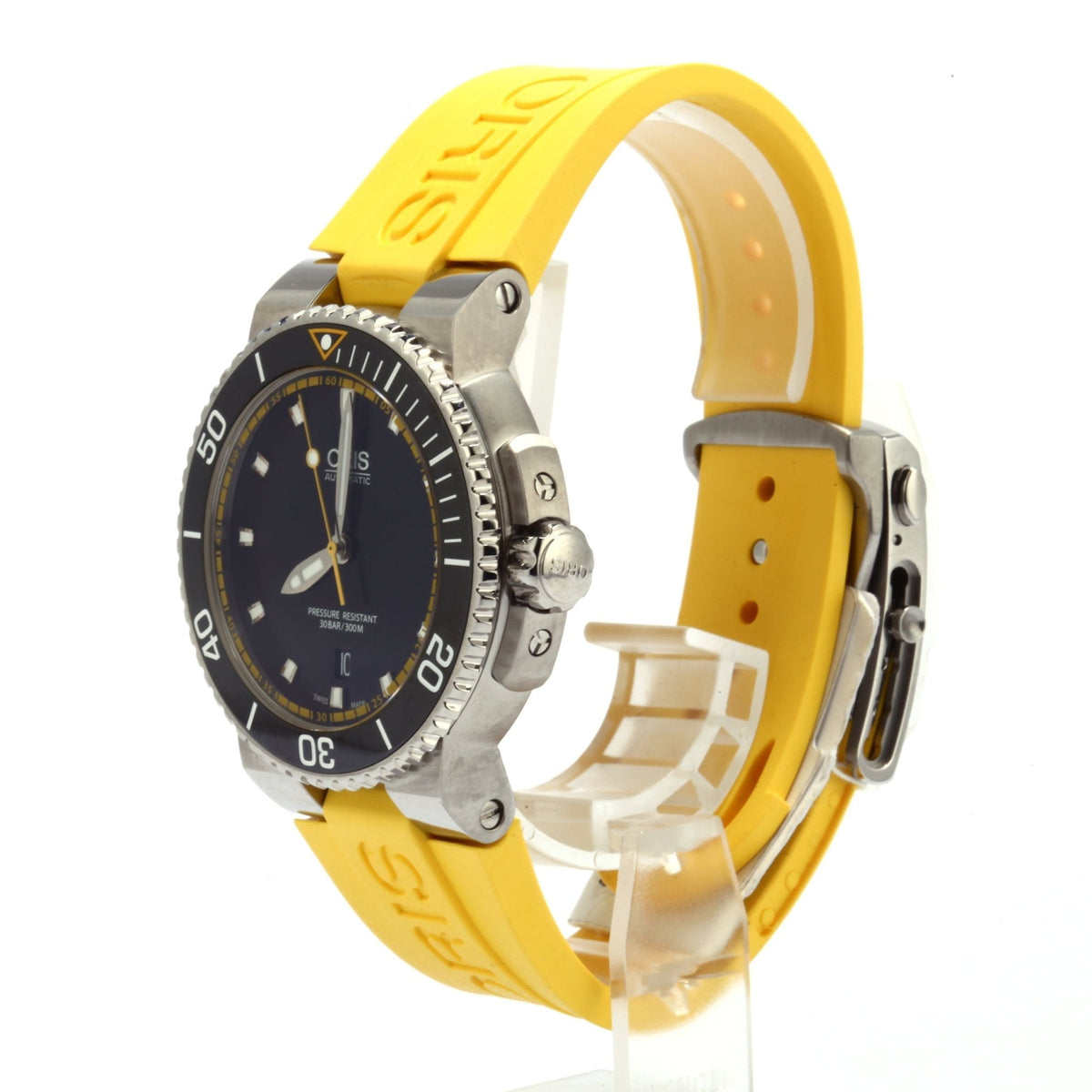GUCCI Dive watch side angle showing stainless steel case with yellow rubber strap and deployment clasp