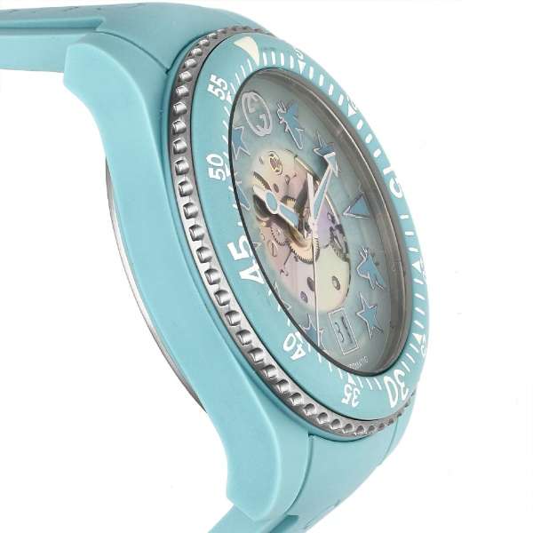 Gucci Dive watch side angle showing aquamarine case and bezel detail