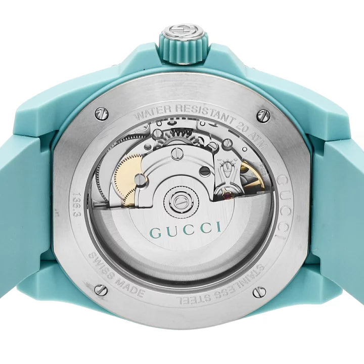 Gucci Dive automatic movement caseback showing mechanical movement and sapphire crystal