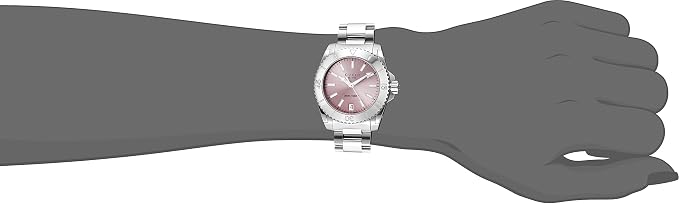 Gucci Dive YA136401 watch on wrist showing pink dial and steel bracelet