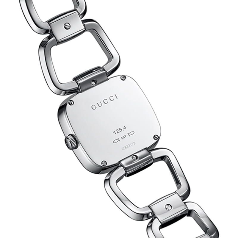 Gucci G-Gucci caseback showing model YA125510 and stainless steel link
