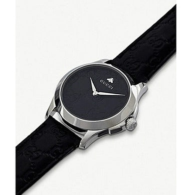 Gucci G Timeless watch worn on wrist showing dial and strap