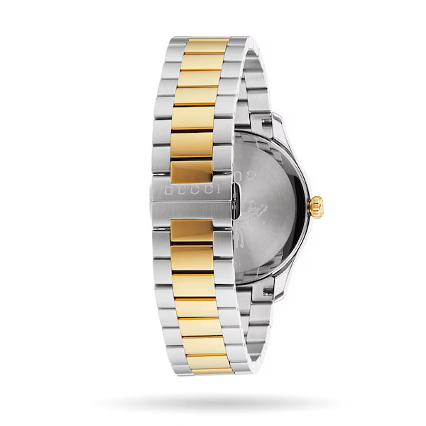 Side profile of Gucci G-Timeless watch displaying two-tone silver and gold link bracelet