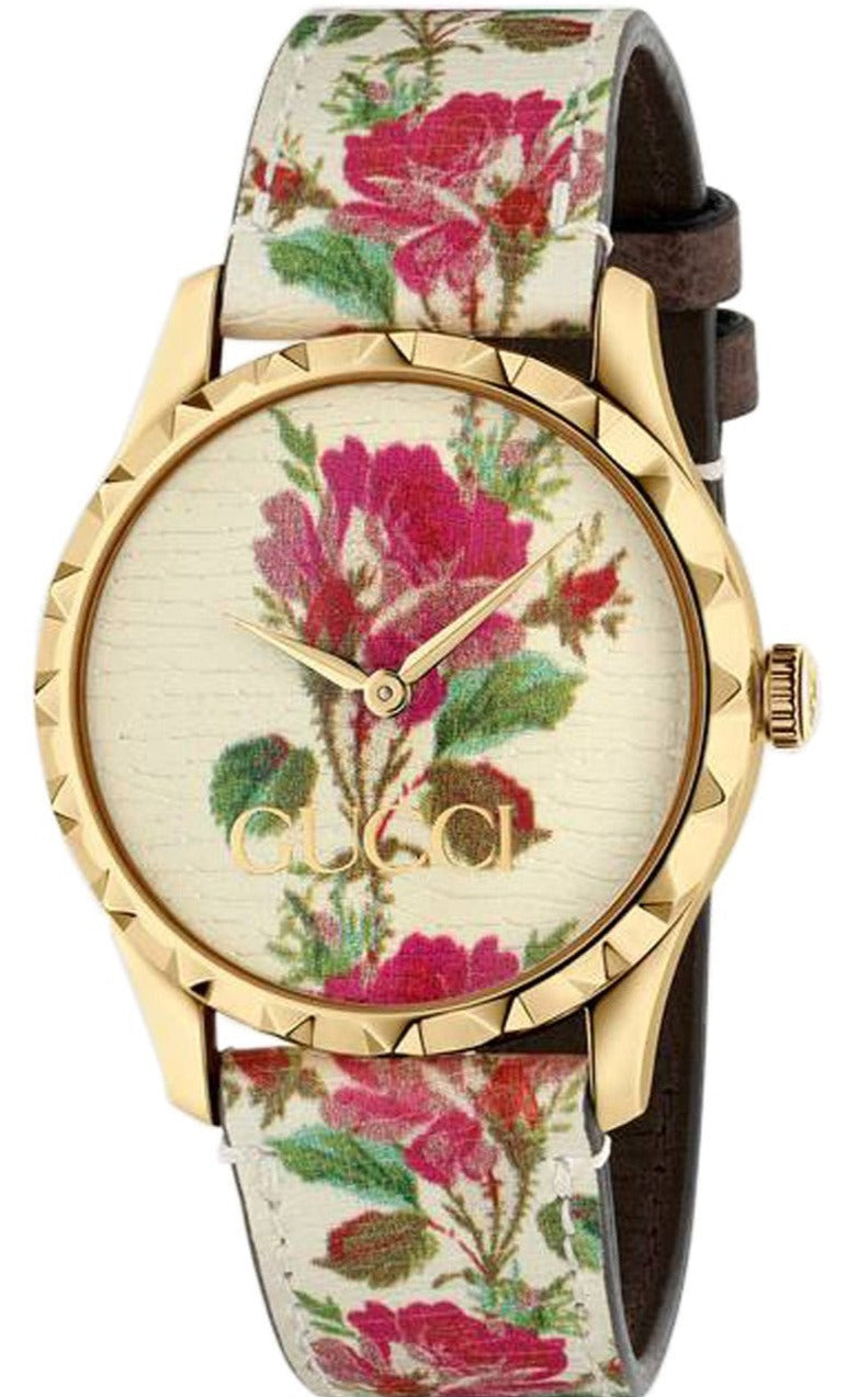Gucci G Timeless watch with floral print dial and matching white leather strap