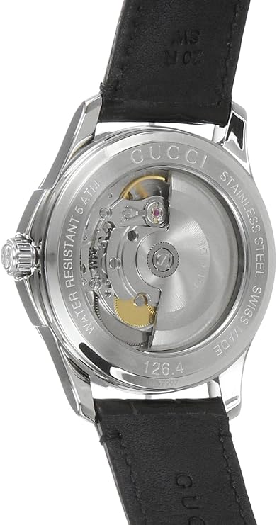 Gucci G-Timeless caseback displaying visible automatic movement and date window