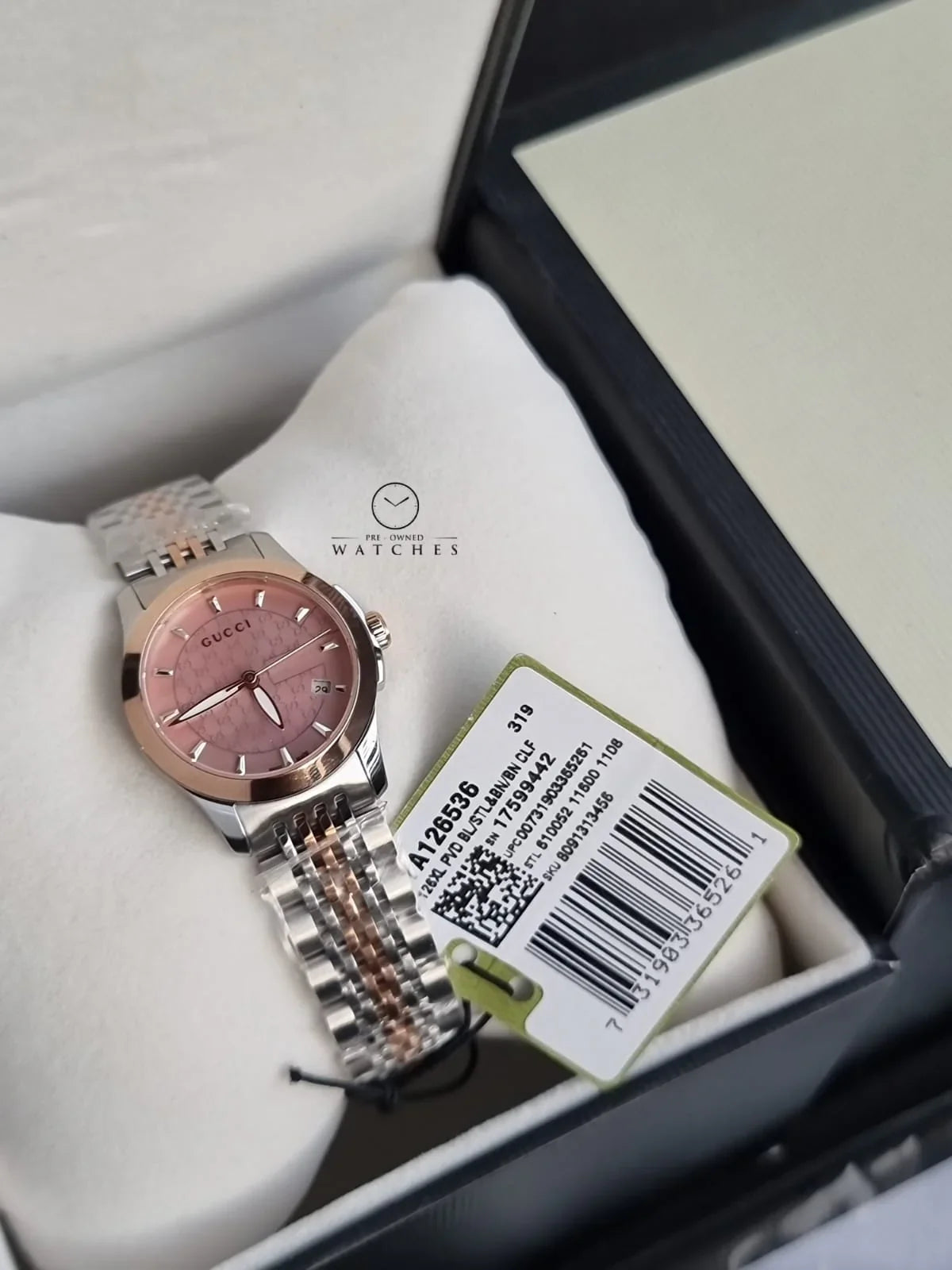 Gucci G Timeless watch in box with warranty card and Gucci branded packaging