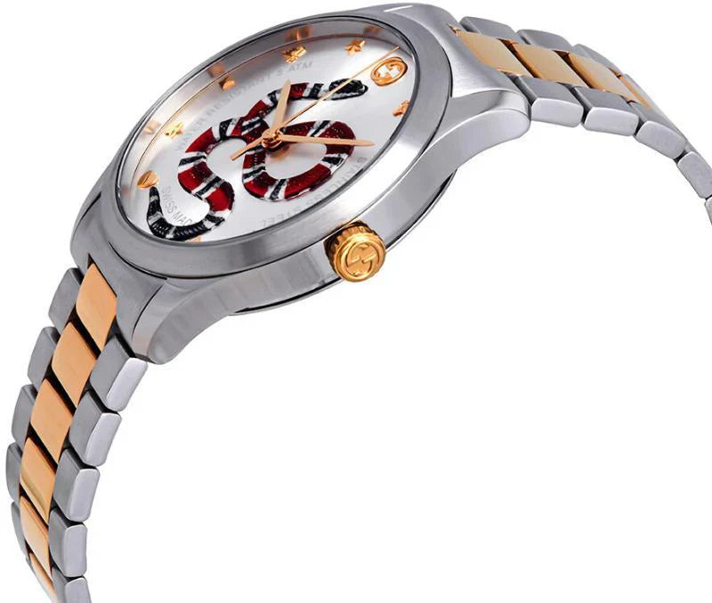 Side view of Gucci G-Timeless watch showing two-tone stainless steel design