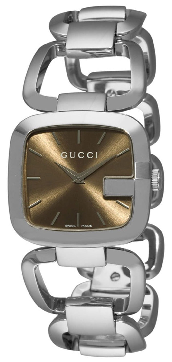 Close-up of Gucci G watch brown dial with hour markers and minimalist design
