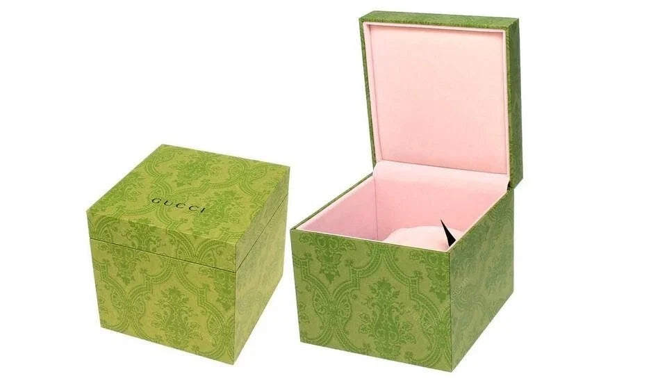 Gucci Model 2000 watch original packaging with green patterned box and pink interior lining