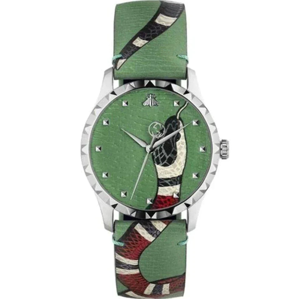 Gucci Le Marche Des Merveilles watch front facing with green dial and patterned strap