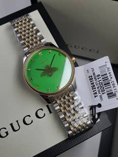Gucci G Timeless watch with packaging and authentication card