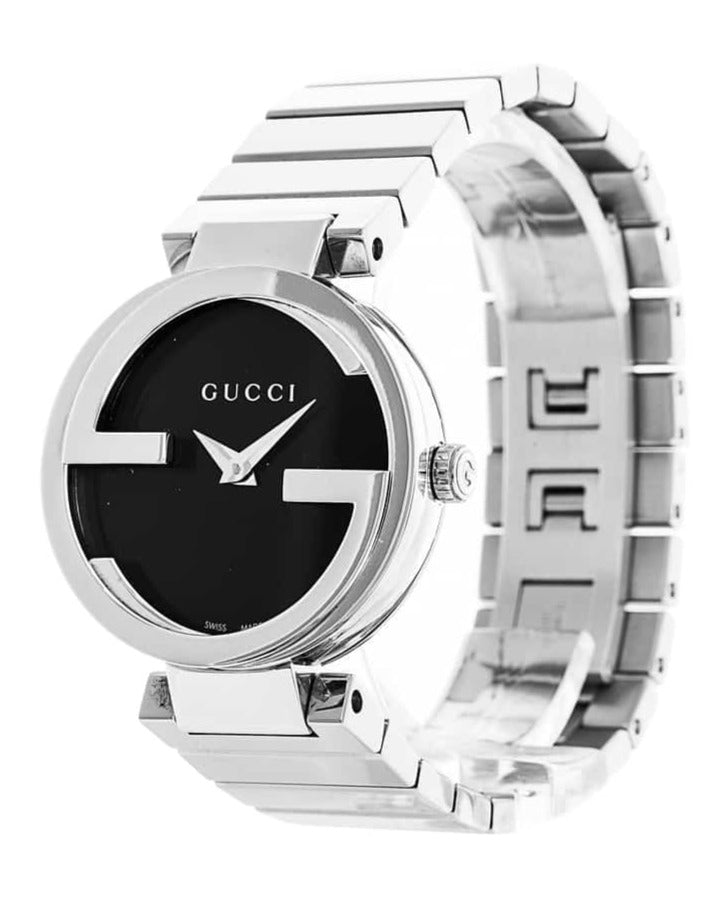 Gucci women's watch from angle showing black dial and steel link bracelet
