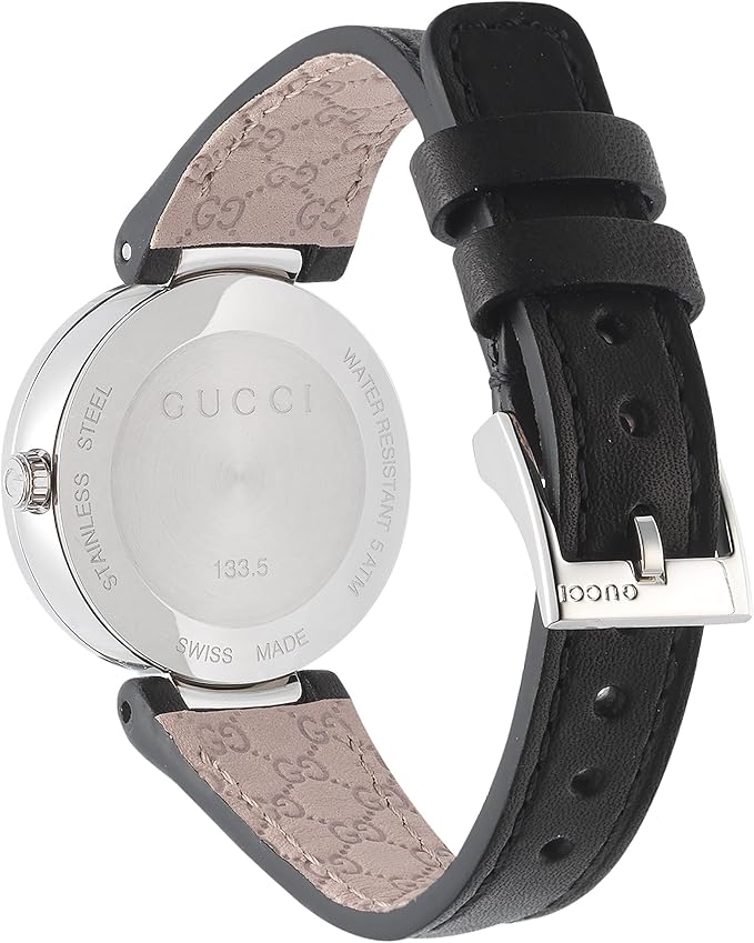Gucci Interlocking G watch caseback showing engraved details and GG-patterned leather strap