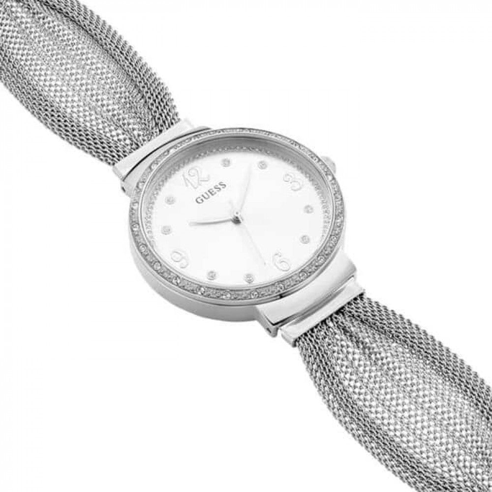 Angled view of Guess Chiffon watch showing silver mesh strap and crystal-set bezel