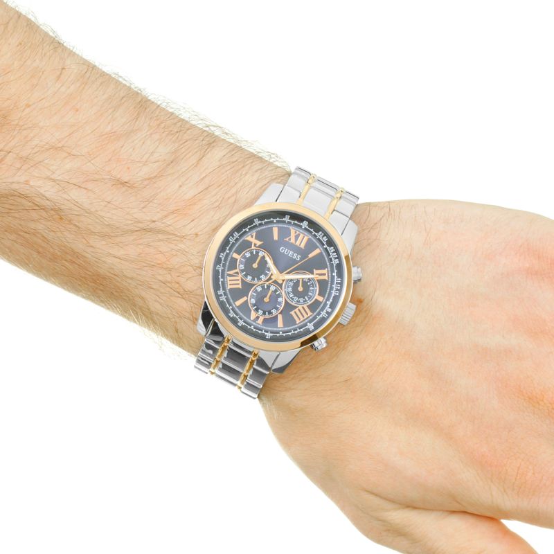 Guess Chrono blue dial silver watch worn on wrist