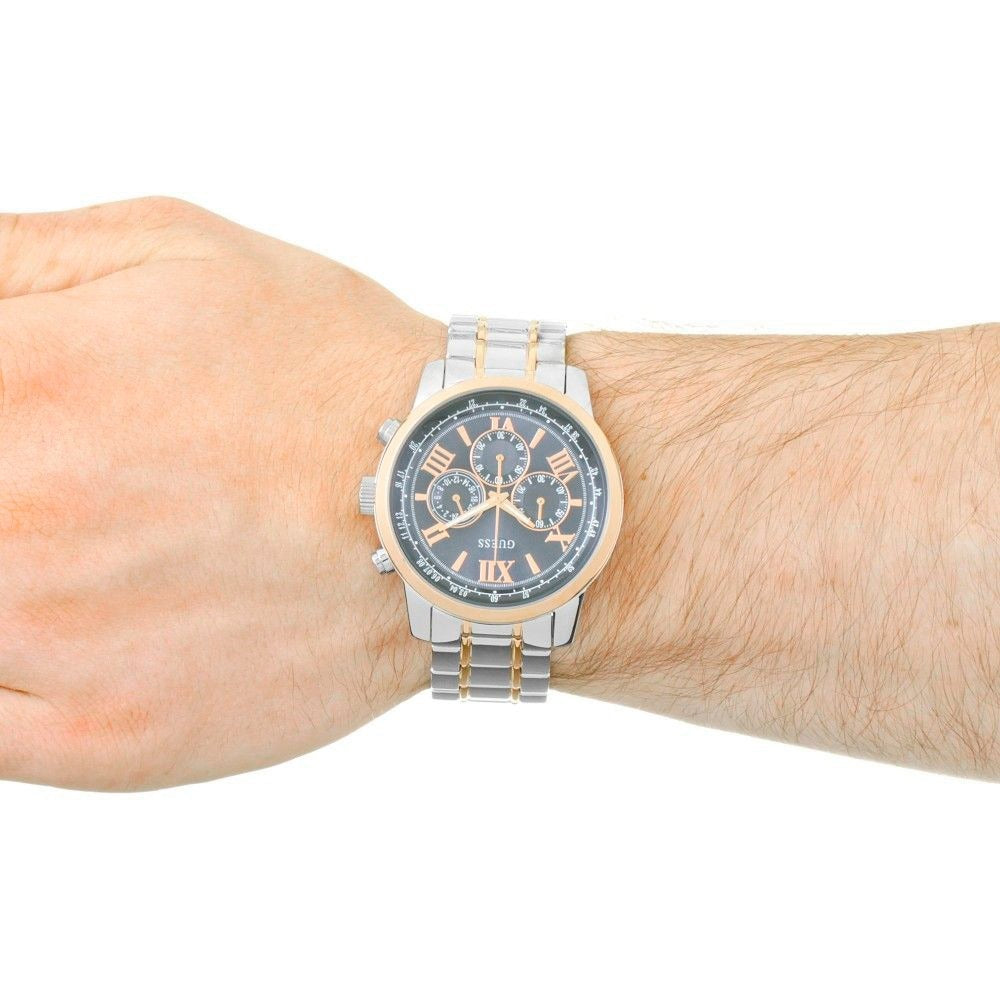 Guess Chrono chronograph watch with blue dial displayed on wrist