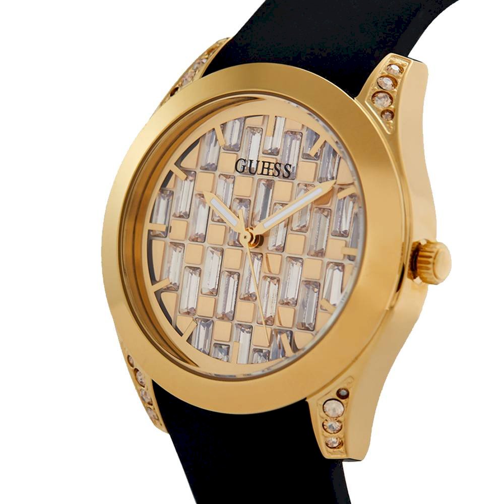 Guess Clarity watch angled view showing gold case with crystal-set lugs and black strap