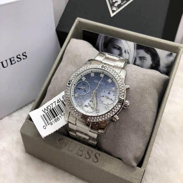 Guess W0774L6 watch in presentation box with Guess branding