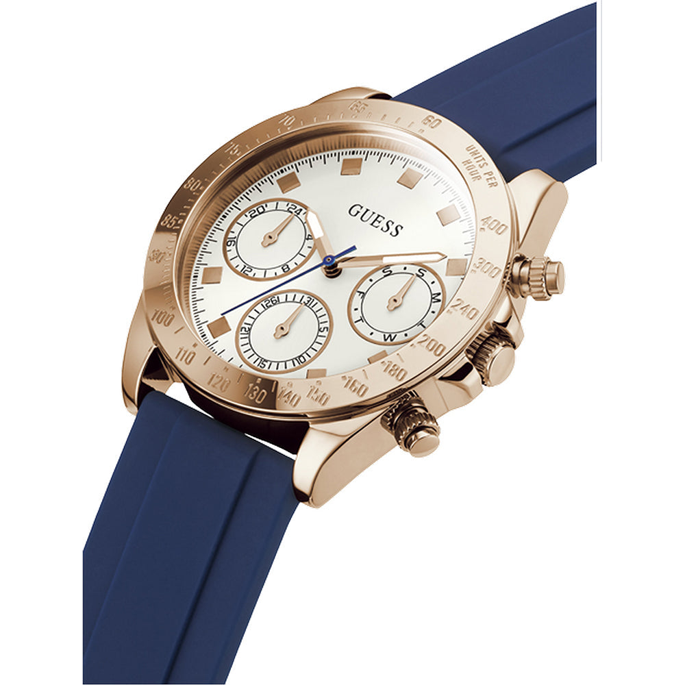 Angled view of Guess Eclipse watch showing rose gold chronograph case and navy blue silicone strap