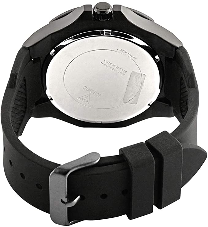 Guess Genesis watch caseback showing stainless steel and engraved details with black rubber strap