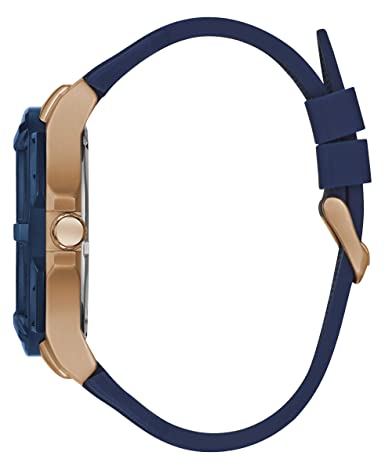 Side view of Guess Genesis watch displaying rose gold case and navy rubber strap