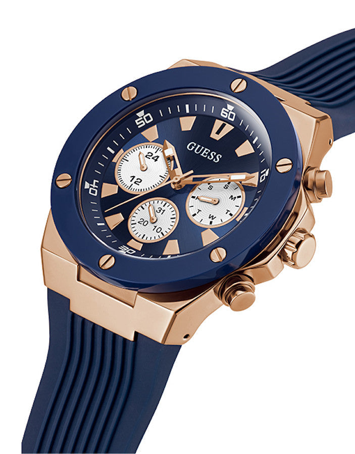 Angled view of Guess GW0057G2 watch showing rose gold case and blue silicone strap