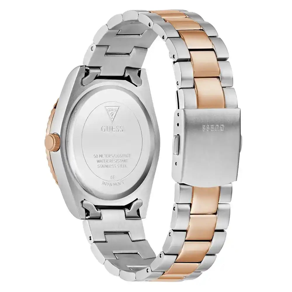 Case back of GUESS GW0265G13 showing engraved branding and two-tone metal links