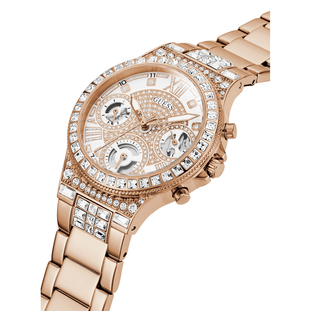 Angled view of rose gold Guess watch showing dial with chronograph subdials and link bracelet