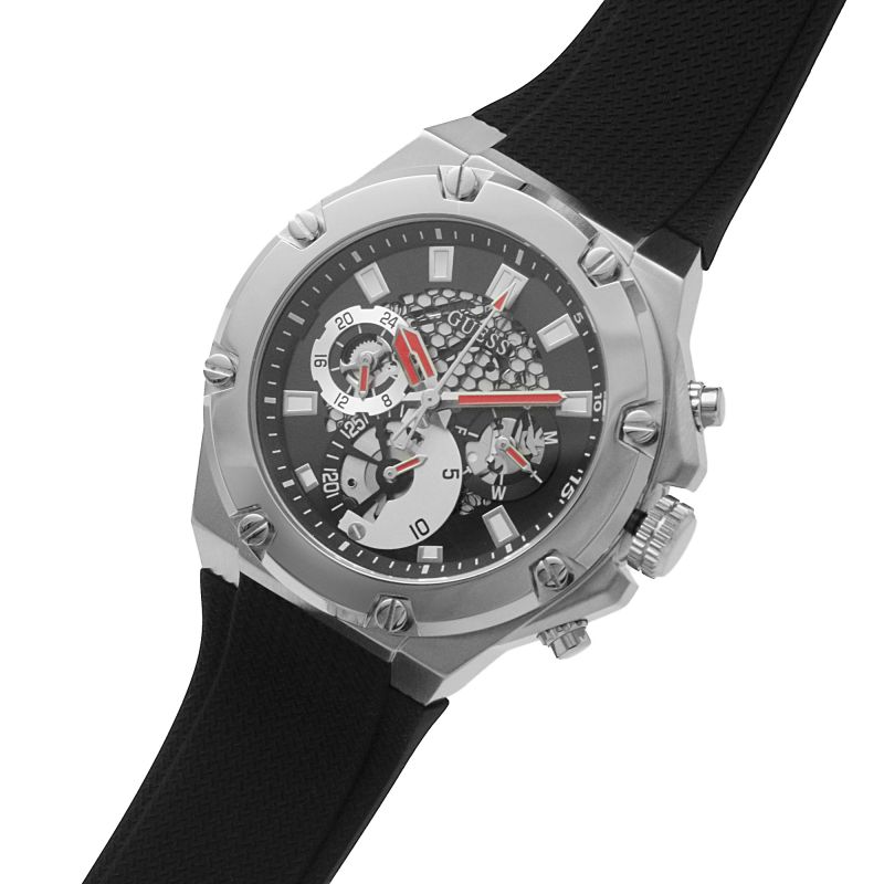 Guess GW0334G1 watch worn on wrist displaying skeleton chronograph dial with silver case
