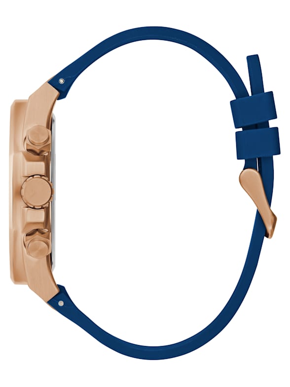 Side view of Guess rose gold tone watch with blue silicone strap and crown