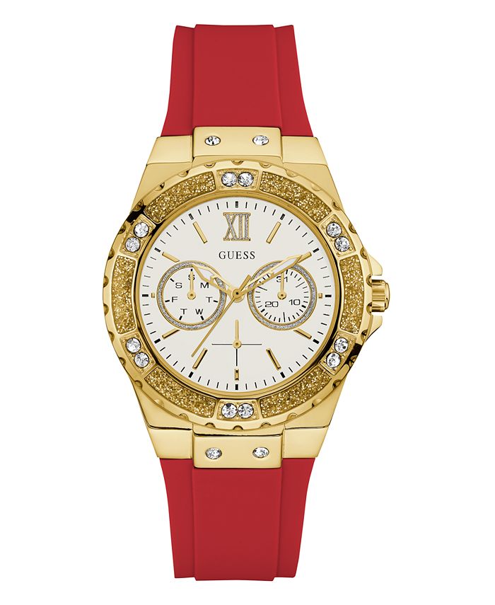 Guess gold tone women's watch with white dial, red silicone strap, and crystal-embellished bezel