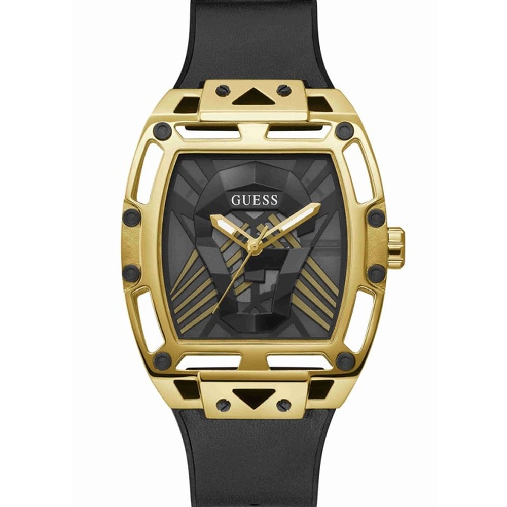 Guess gold tone watch with geometric case design and black rubber strap, angled view