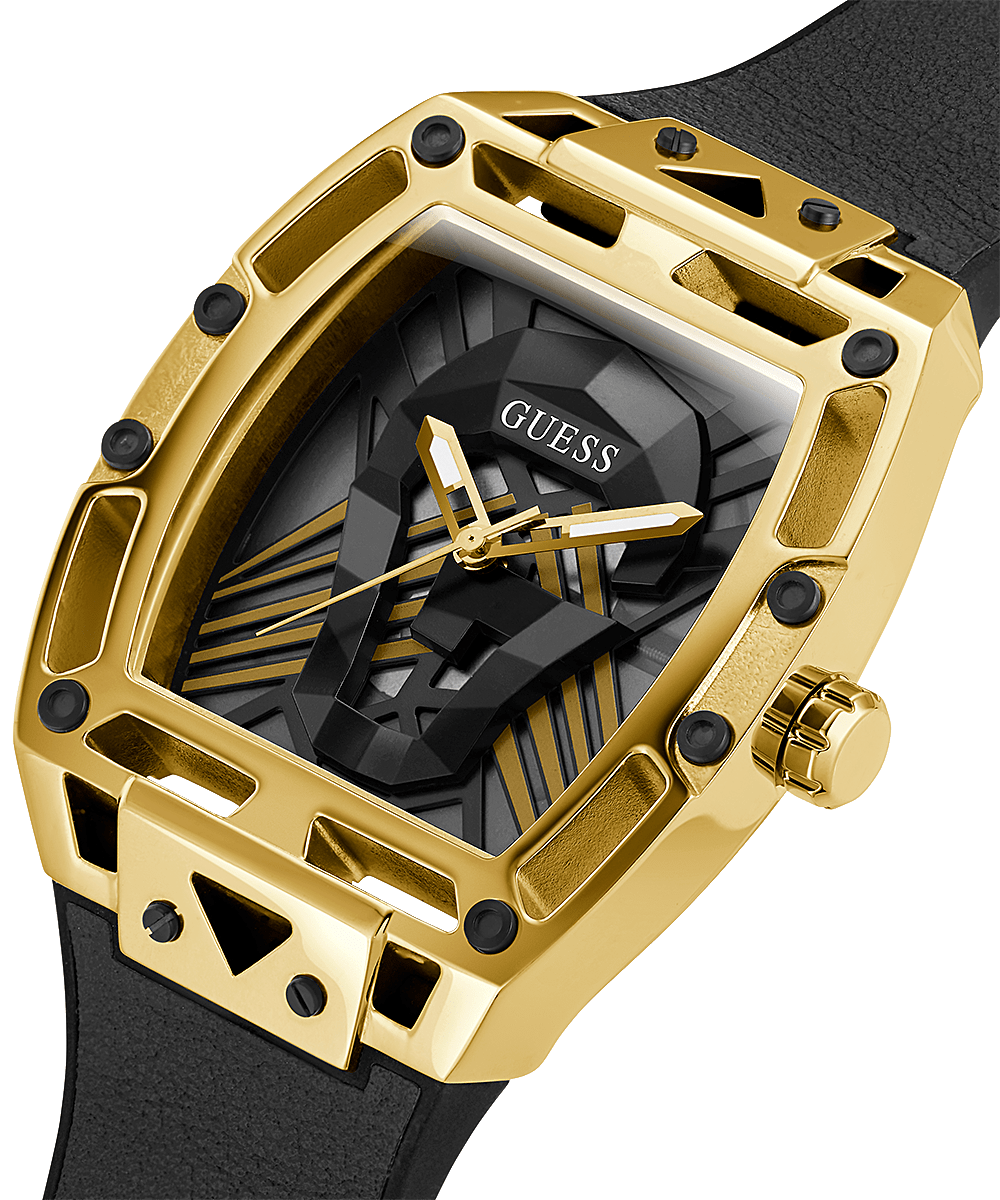 Guess gold tone watch on wrist, showcasing dial and case details