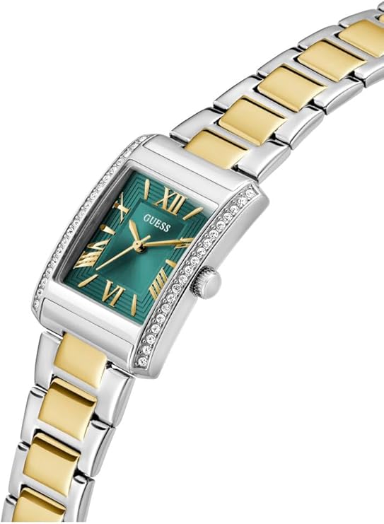 Angled view of GUESS watch with green dial and two-tone metal band