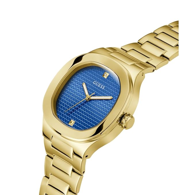 Gold-tone Guess HEADLINE watch detail showing blue textured dial and numerals