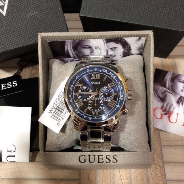 Guess Horizon chronograph watch in original packaging with black box and tan presentation case