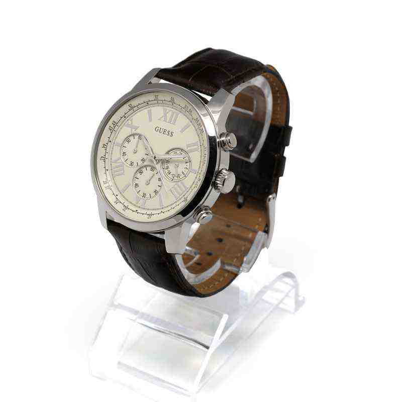 Guess Horizon watch displayed at angle showing cream dial with three subdials