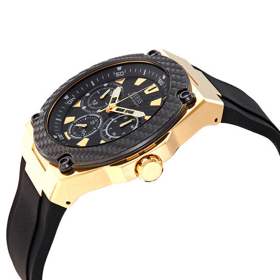 Side angle view of Guess Legacy watch showing gold case and black rubber strap
