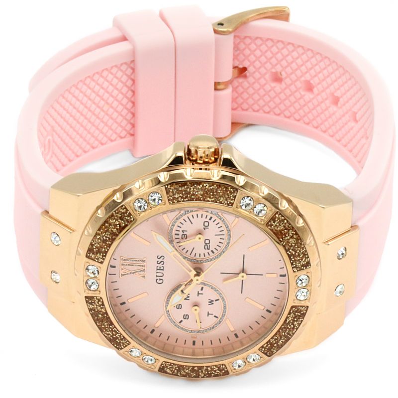 Guess Limelight watch strap detail showing pink silicone band with quilted texture and gold buckle