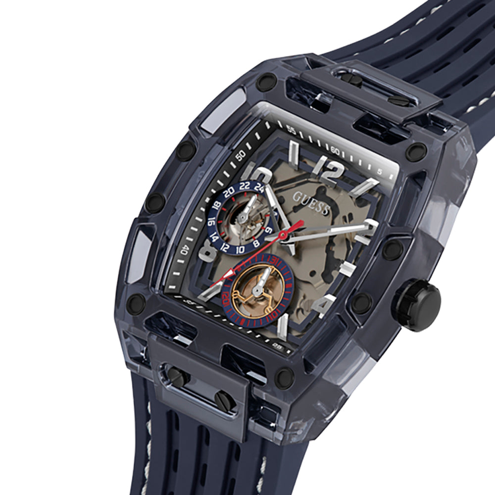 Guess Phoenix watch angled view showing skeleton dial with visible movement and navy strap
