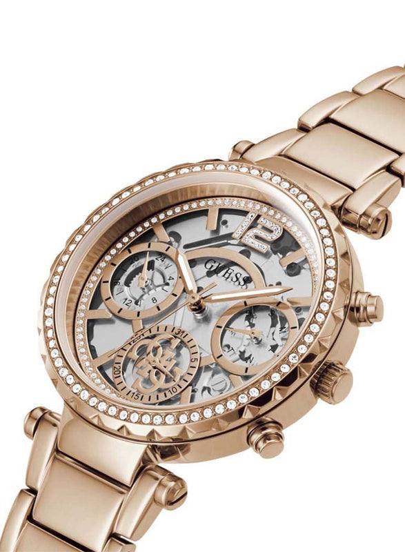 Angled detail view of Guess Solstice rose gold watch skeleton chronograph dial