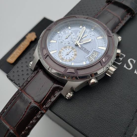 Guess W0673G1 chronograph watch detail with dial and Guess branding visible