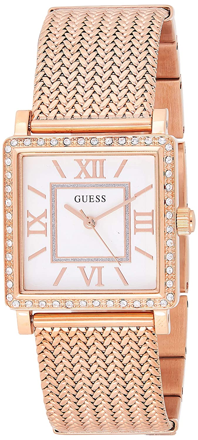 Guess women's analog watch with white square dial, rose gold case, crystal bezel, and rose gold mesh strap