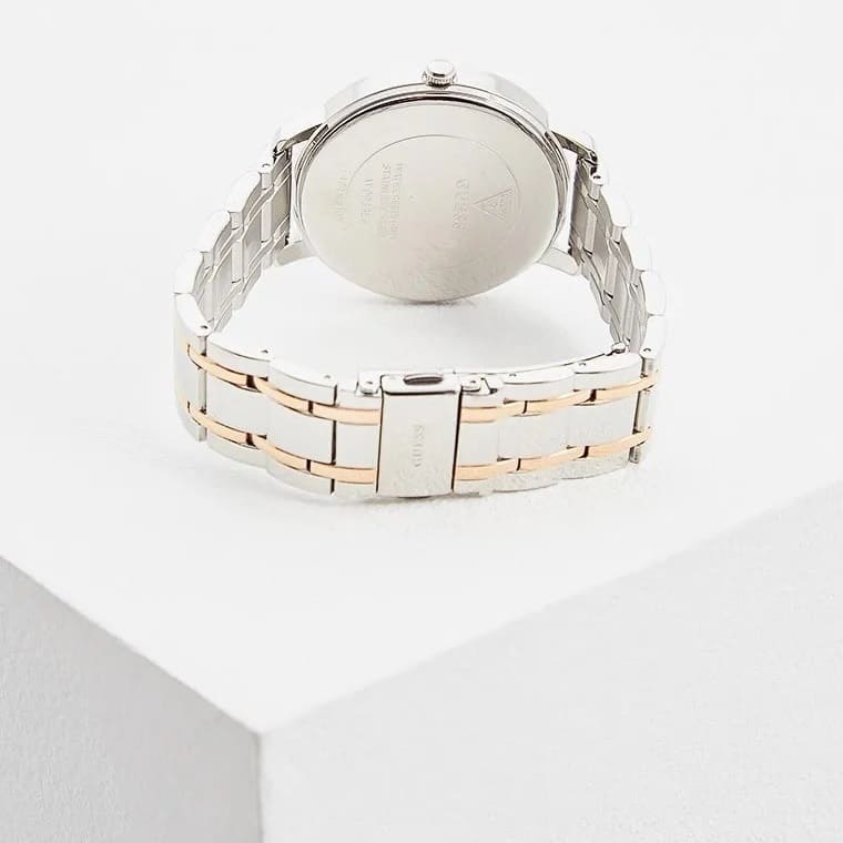 Caseback of Guess W0933L6 women's watch showing stainless steel back