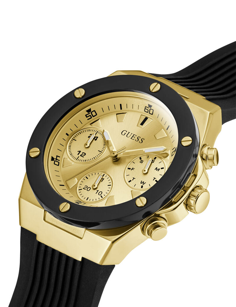 GUESS GW0030L2 gold tone chronograph watch with black bezel and rubber strap, angled view