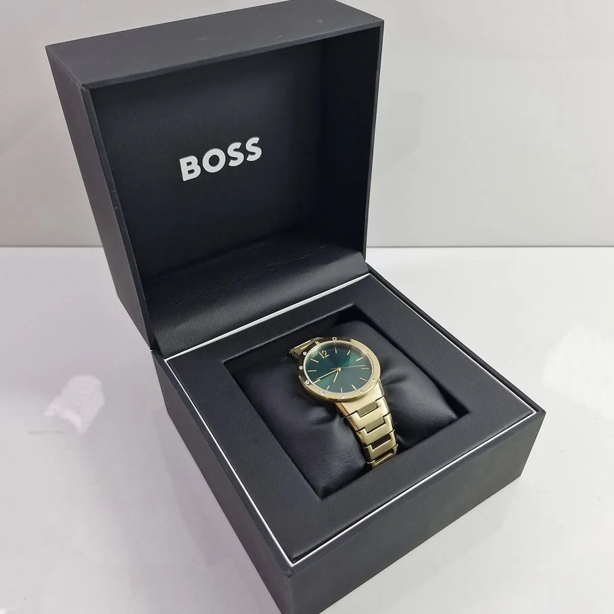 Hugo Boss watch in open black gift box with BOSS branding