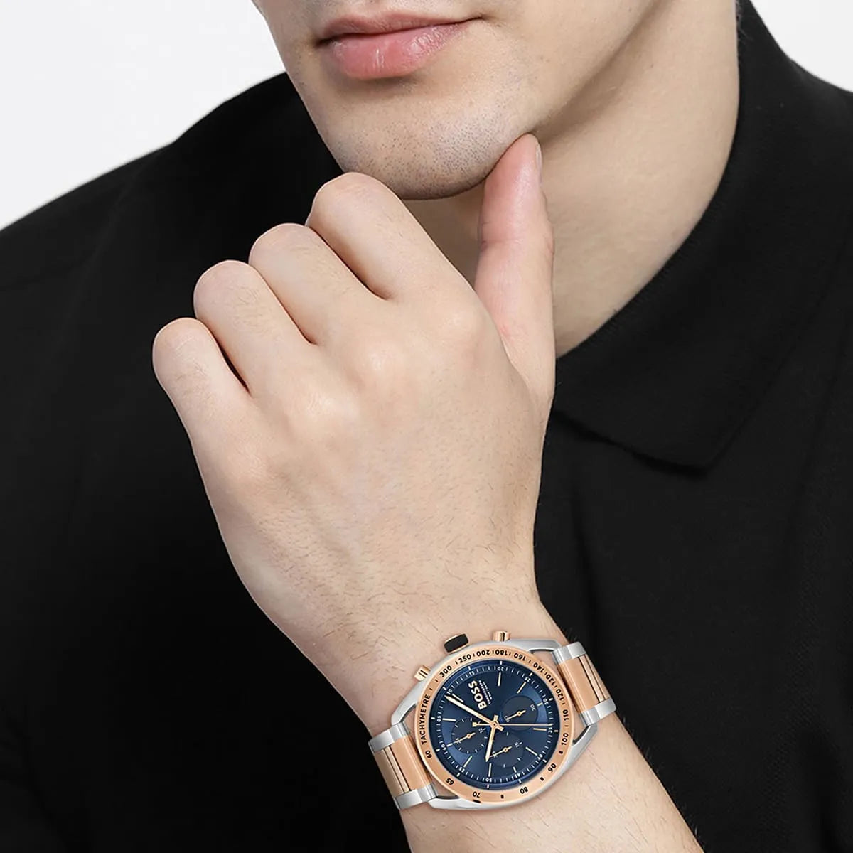 Wrist view of Hugo Boss two-tone chronograph with blue dial