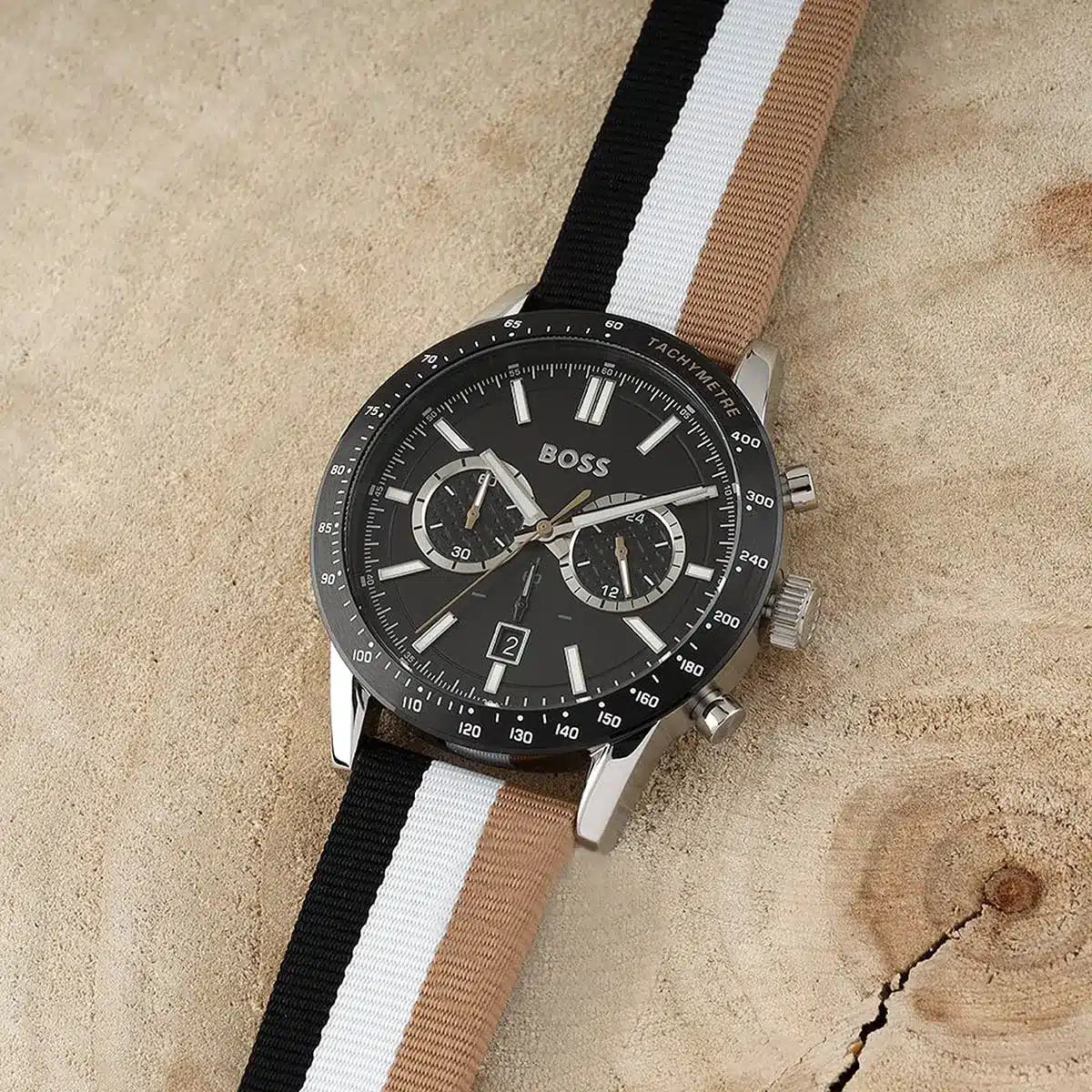 Hugo Boss Allure chronograph watch on natural background showing full view of dial and multicolor strap