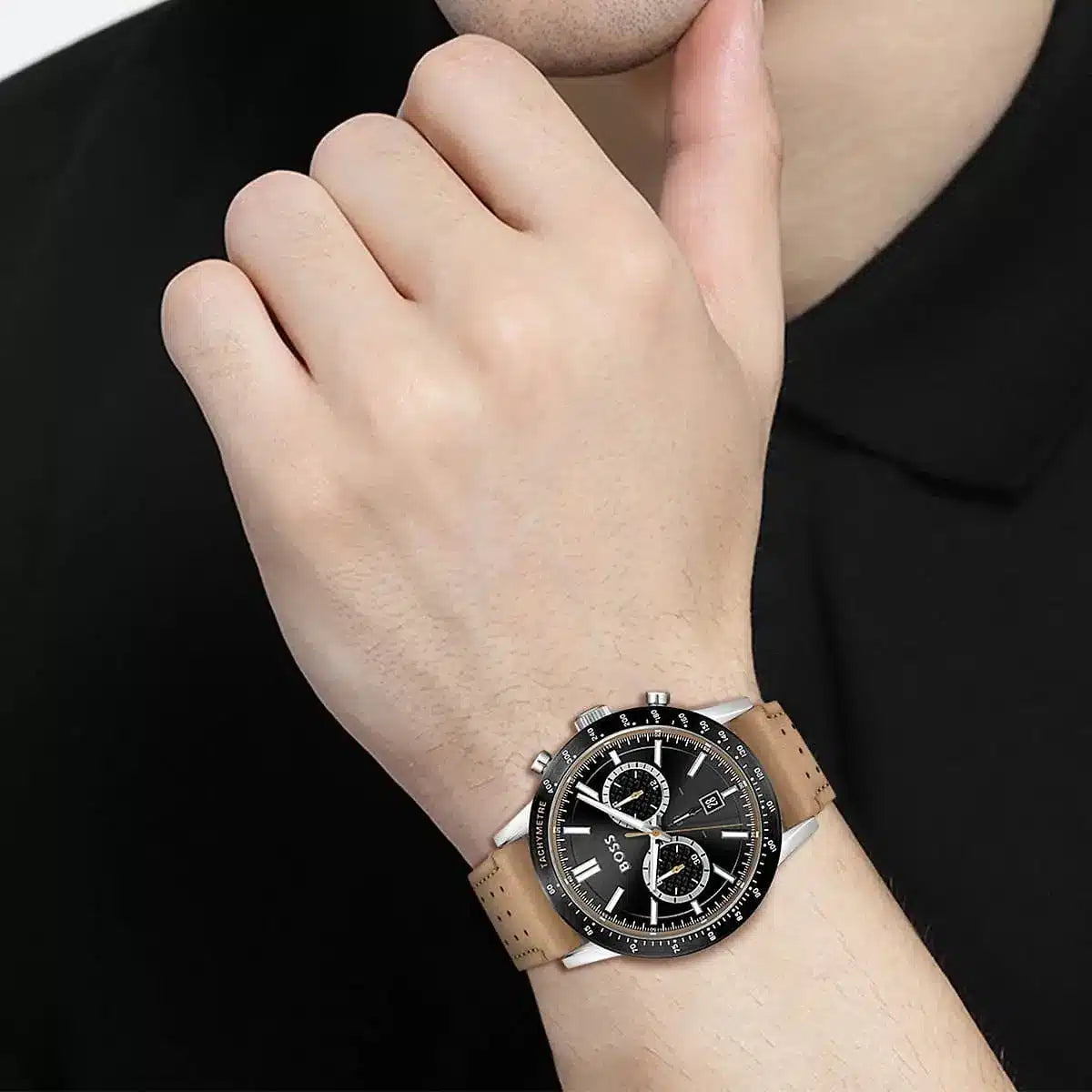 Hugo Boss Allure chronograph watch worn on wrist against black background