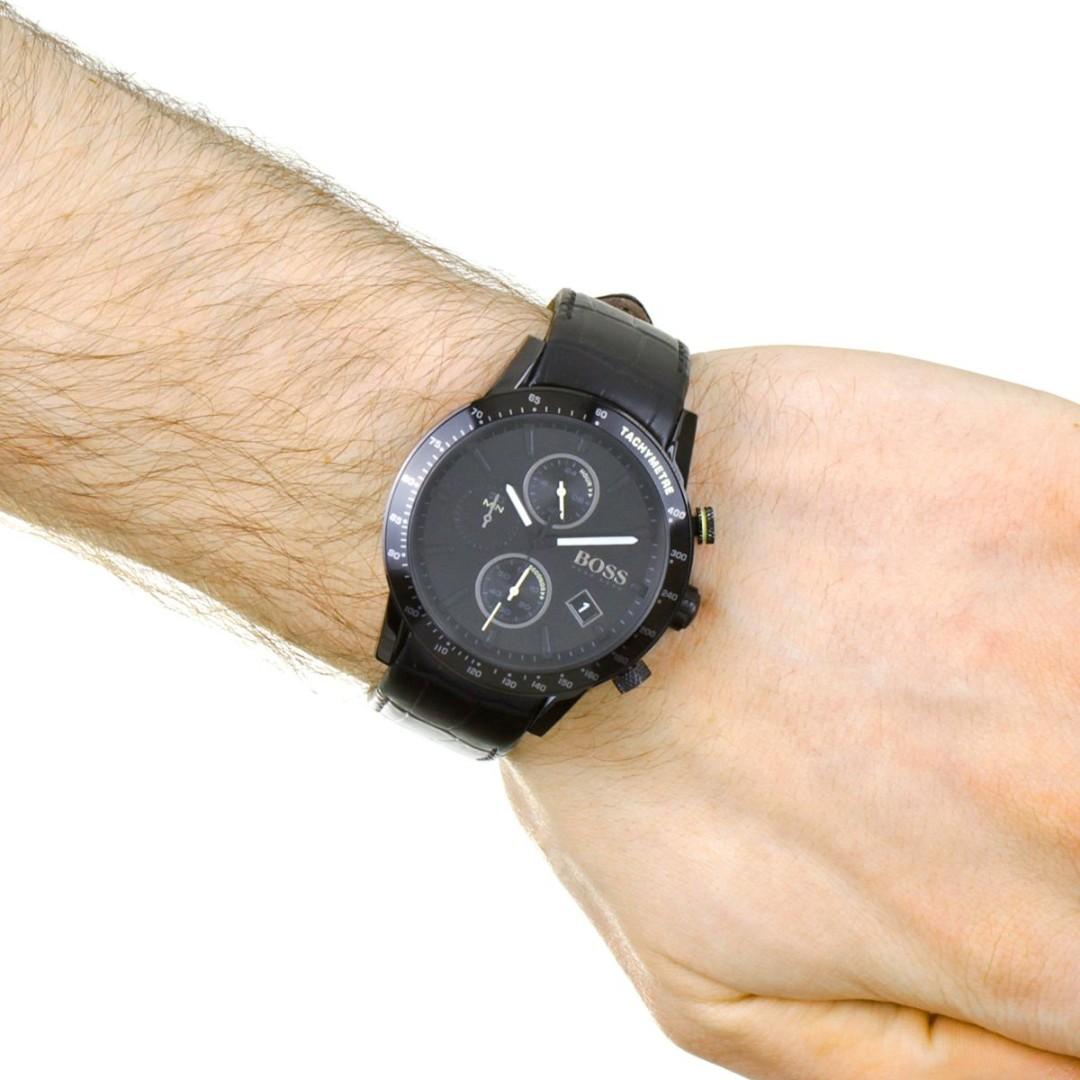 Hugo Boss black chronograph watch worn on wrist with black leather strap